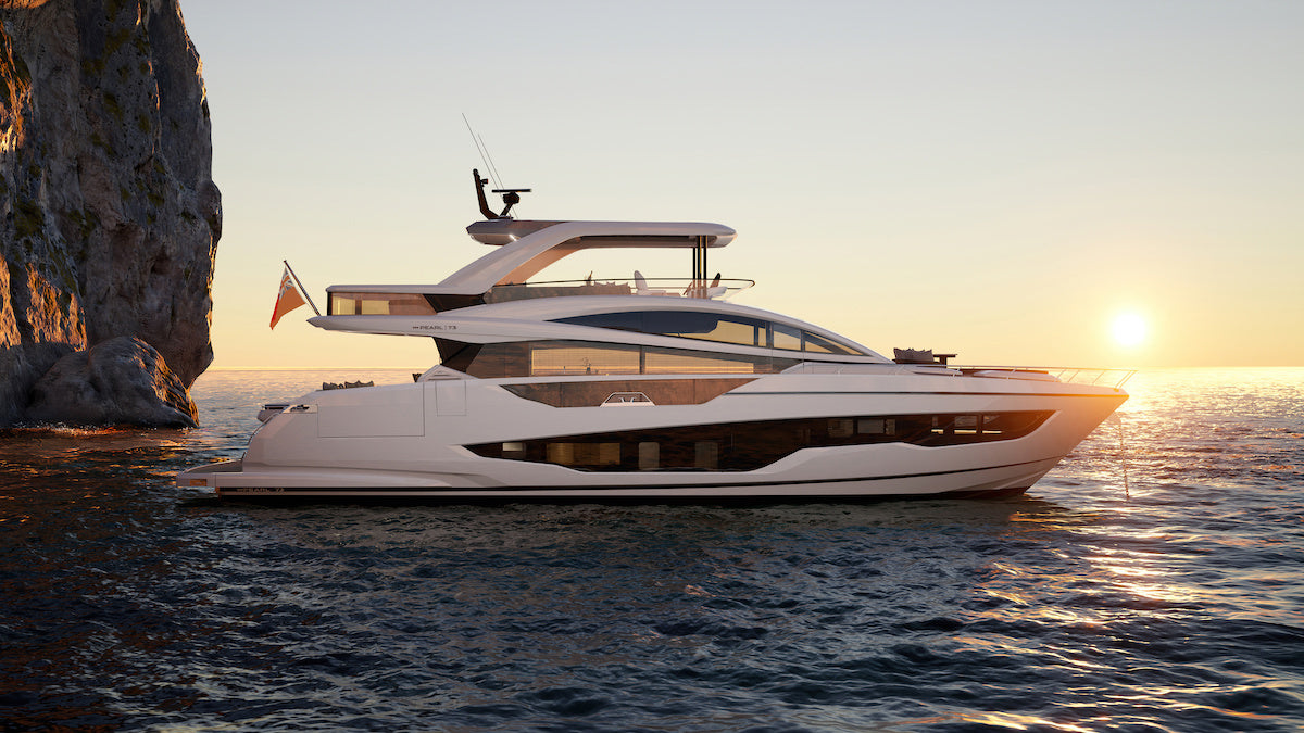 Pearl 73 motor yacht on the water at sunset